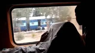 11111 Sushasan Exp Overtaking 19038 Awadh Exp at Burhwal junction.