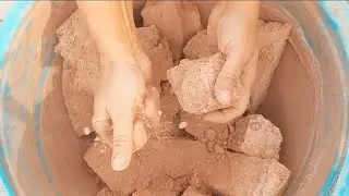 Red dirt chunks Crumbling in tub for Stress Relief 