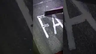 Hammer and chisel stone lettering in slate