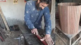 Making a wooden Panja machine sheet.Cotton ginning.