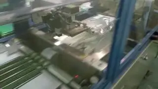 Doblar y embolsar camisetas automatico