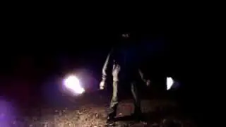 Slow motion fire spinning