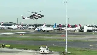 Helicopter Landing at Heathrow Terminal life of elite British class