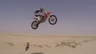 Dirt bike desert free riding, Dune jumps and wheelies in Qatar sealine desert.