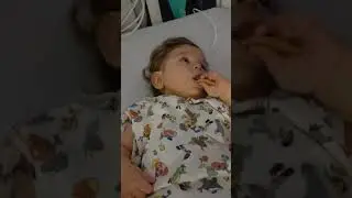 G button fed baby eating for the first time