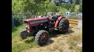 Lot 01-0210: Massey Ferguson 374S Tractor