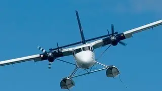 Seaplane Landing In Grass Field