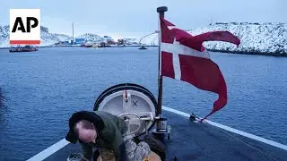 Danish military patrolling waters around Greenland, AP explains
