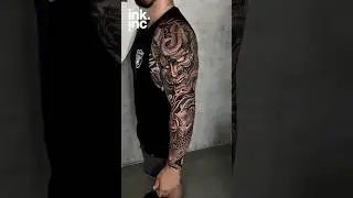 Japanese full sleeve tattoo with Hannya mask, koi fish, and water waves