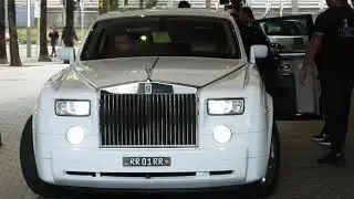 Tyga leaves hotel in rolls Royce