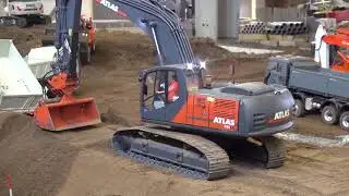 Atlas LC 260 Excavator works on dike construction