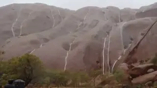 Uluru in heavy downpour