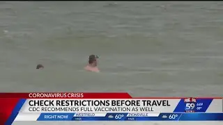 CDC: Get fully vaccinated before traveling