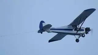 Plane-spotting at Coney Island beach Piper PA-18A-150 Super Cub
