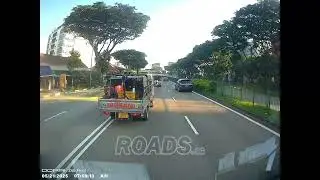 Nissan Lorry GBH698X went over the double white line when overtaking camcar
