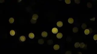 Bokeh background black with warm white light HD3&ndash; Motion 2 - Fluid Theory B-Roll