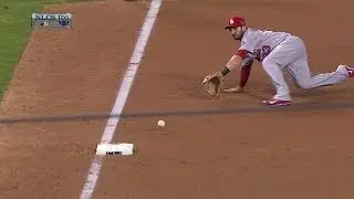 Descalso makes a nice sliding stop at third
