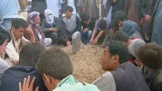 Mass Burial Held in Kabul for Blast Victims