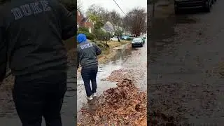 Massive flooded street drain opening!