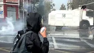 Chilean police disperse May Day protesters with water cannons