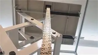 Tsubaki raising lift table using Zip Chain Lifter