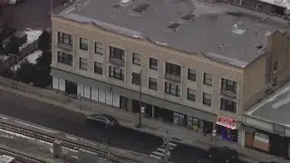 Neighbors ban together to buy building and revitalized Jackson Park Highlands corridor