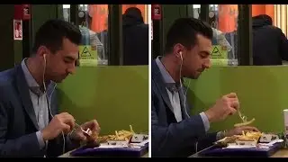 Hilarious! Man dressed in a suit is filmed eating McDonalds with a fork