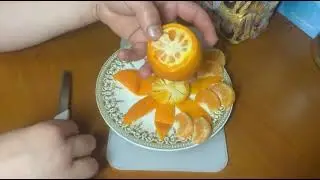 Creative Fruit Art: Simple Orange Flower Design&rdquo;