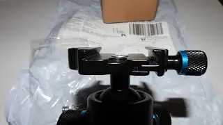 Andoer TB81X, absent Quick Release Plate