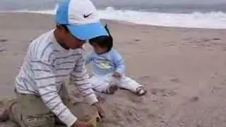 MANUEL Y MARIEL EN LA PLAYA REVES