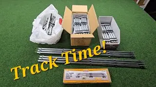 Model Train Layout Build - Part 2!! Getting Grass Down! Laying Out Track!