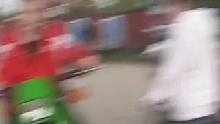 Guy is hit by a bottle