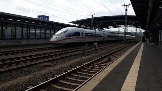 Trains arriving leaving passing Montabauer