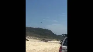 Ute and jet ski getting bogged on Teewah Beach