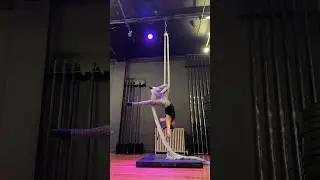 Candy Cane Roll Up into a Knee Hang on the Aerial Silks! #aerialsilks #aerialarts #aerialist