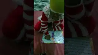 small baby with reading urdu book