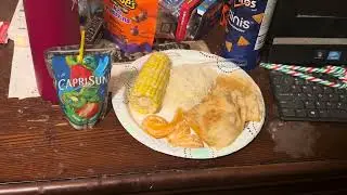 Cheese Quesadilla, Rice, Corn, Orange Slices, and Strawberry Kiwi Capri Sun Juice