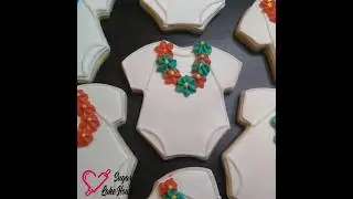 Delicious ways to announce a baby #babyshower #babyshowercookies #luaubaby