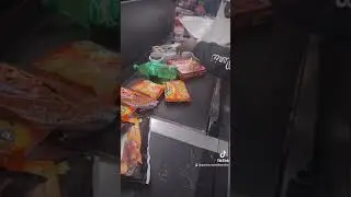 At the checkout counter saving money buying food Shopping cheap on a Budget I spent less than 40.00