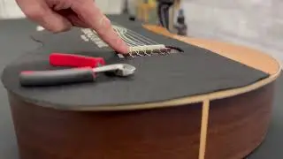 Strings By Mail Bridge-Bib guitar protector during repairs or string changes