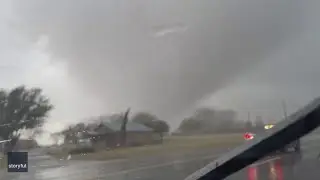 Watch: Massive Funnel Cloud Moves Across Texas Highway