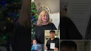 Reading a card message sent from a Taiwanese student for a senior in Memphis