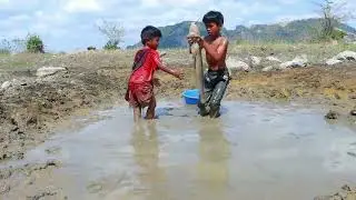 Two Rural Boys Catching Catfish by Hand in the Valley 🐟 #CatfishFishing #HandFishing #RuralFishing