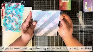 Embossing with interference inks on two tone card