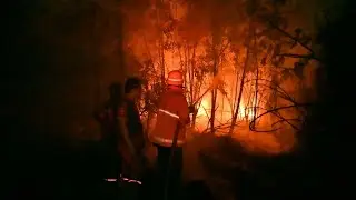 Indonesia battles night fires amid regional smog crisis | AFP