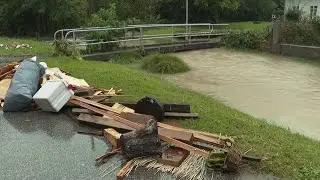 Firefighters pump out flooded basements as torrential rain continues to lash eastern Austria