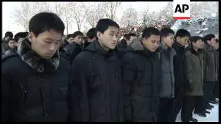 Tens of thousands of mourners at ceremony, moment of silence