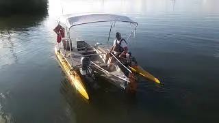 Outrigger Canoe with 1.5 HP Outboard Honda Motor.