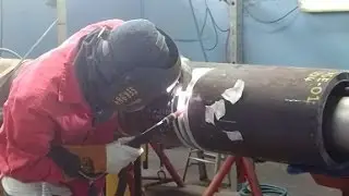 Tig welding the root in a 10 inch clad lined pipe.