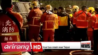 At least 32 people dead after tour bus crash in Taiwan
